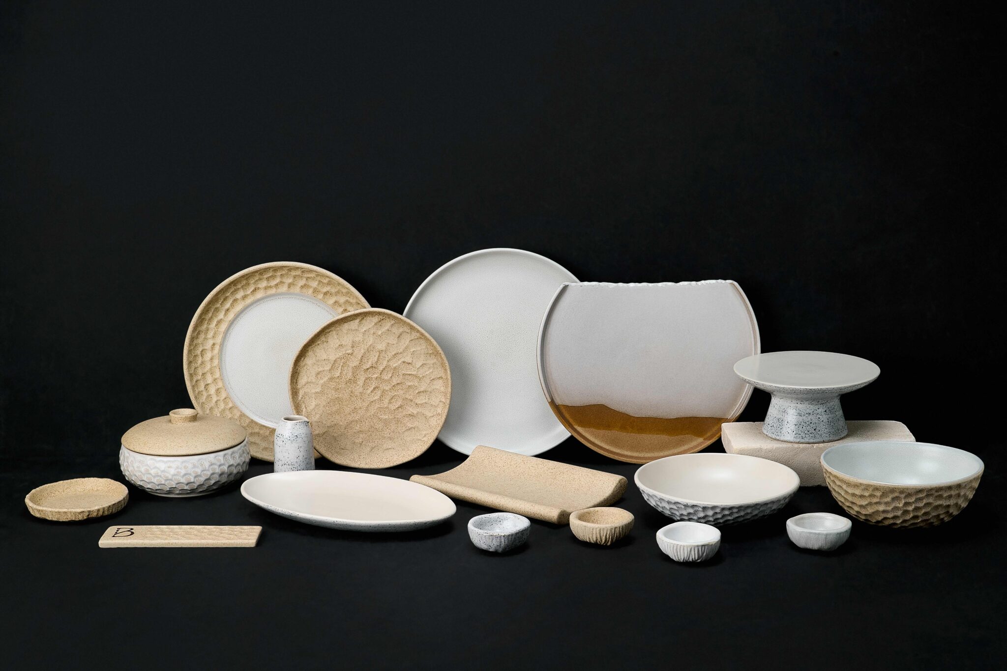 Bespoke ceramic tableware by Kevala Ceramics for Maniq Restaurant at Bambootel, inspired by bamboo architecture and tropical dining