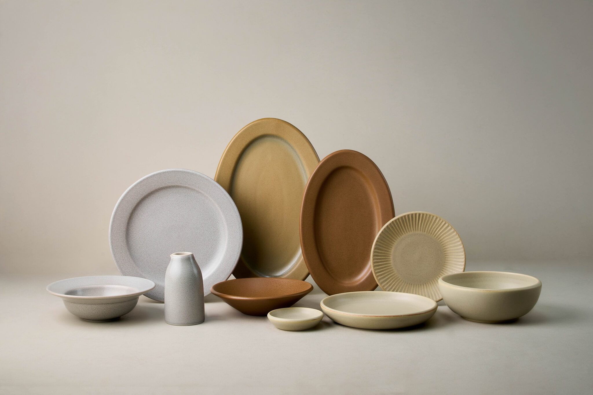 Bespoke ceramic tableware by Kevala Ceramics for Mason Bali, designed for a contemporary dining experience